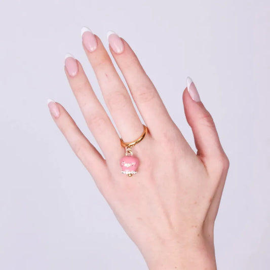 AMO CAPRI - ANELLO ACCIAIO DORATO CON CAMPANELLA SMALTO ROSA E CRISTALLI
