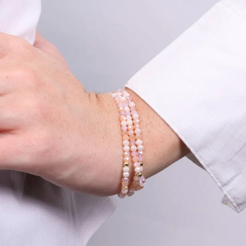 AMO VENEZIA - BRACCIALE ELASTICO IN METALLO CON PERLINE BEIGE