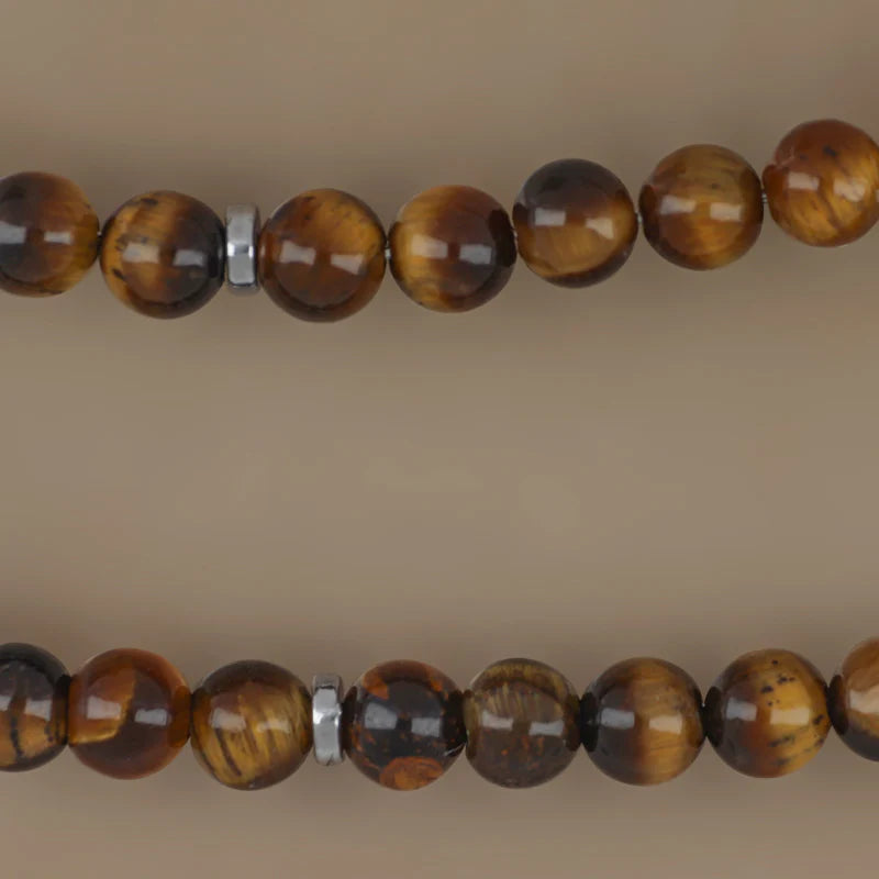 GOYATE' - COLLANA UOMO IN ACCIAIO E PIETRE SFERICHE MARRONI