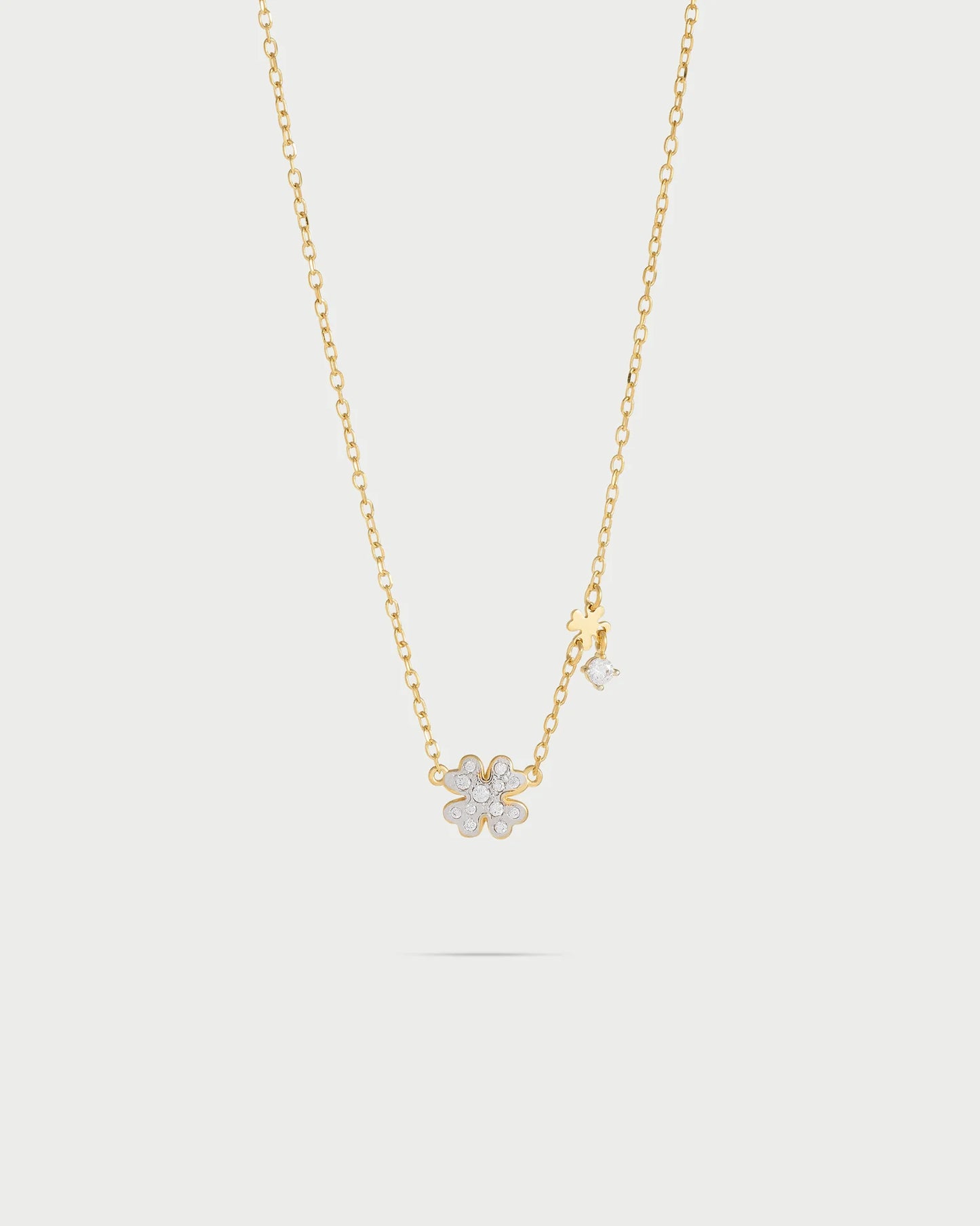 GIROCOLLO ARGENTO DORATO CON QUADRIFOGLIO PAVE' ZIRCONI