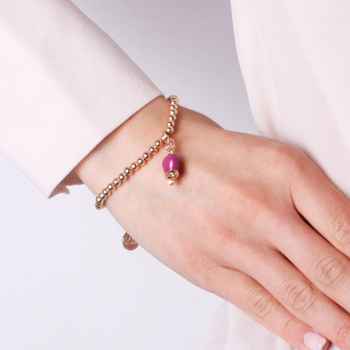 AMO CAPRI - BRACCIALE IN METALLO CON CAMPANELLA MINI VIOLA CON PUNTO LUCE