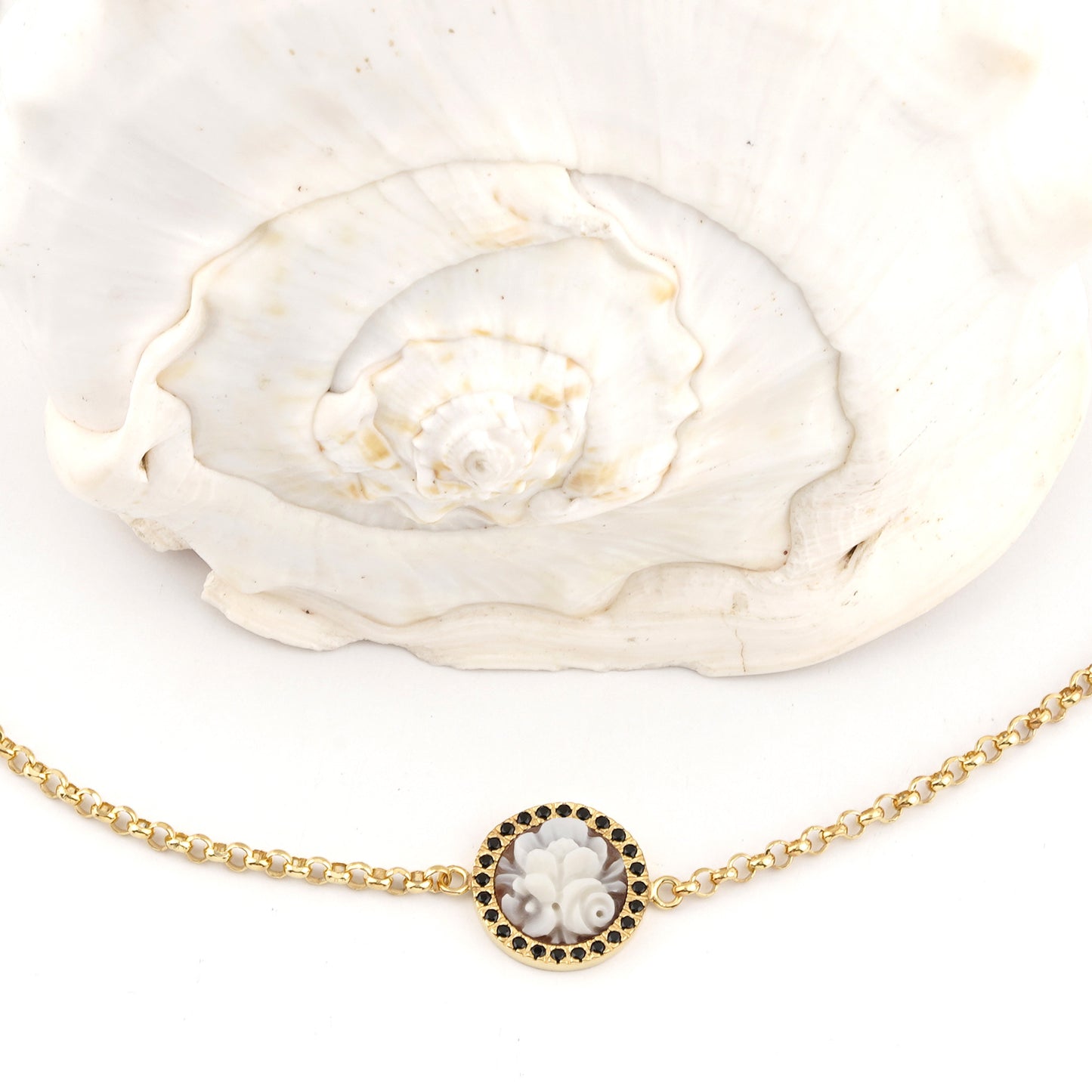 CAMEO ITALIANO - BRACCIALE SUNRISE CON CAMEO CENTRALE FIORI  E CONTORNO DI ZIRCONI NERI