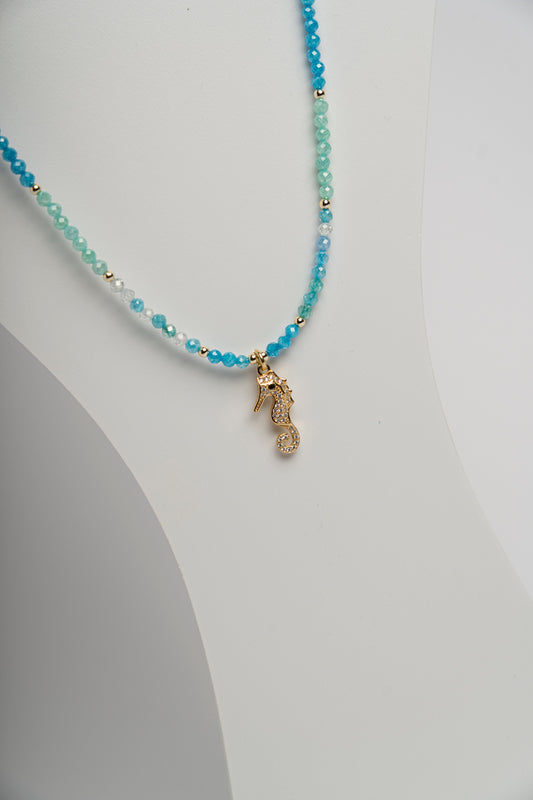 SICYLUI - COLLANA GIROCOLLO CON ZIRCONI AZZURRI E CAVALLUCCIO DORATO