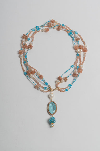 SICYLUI - COLLANA CON CRISTALLO ACQUAMARINA CENTRALE E PIETRA DEL SOLE