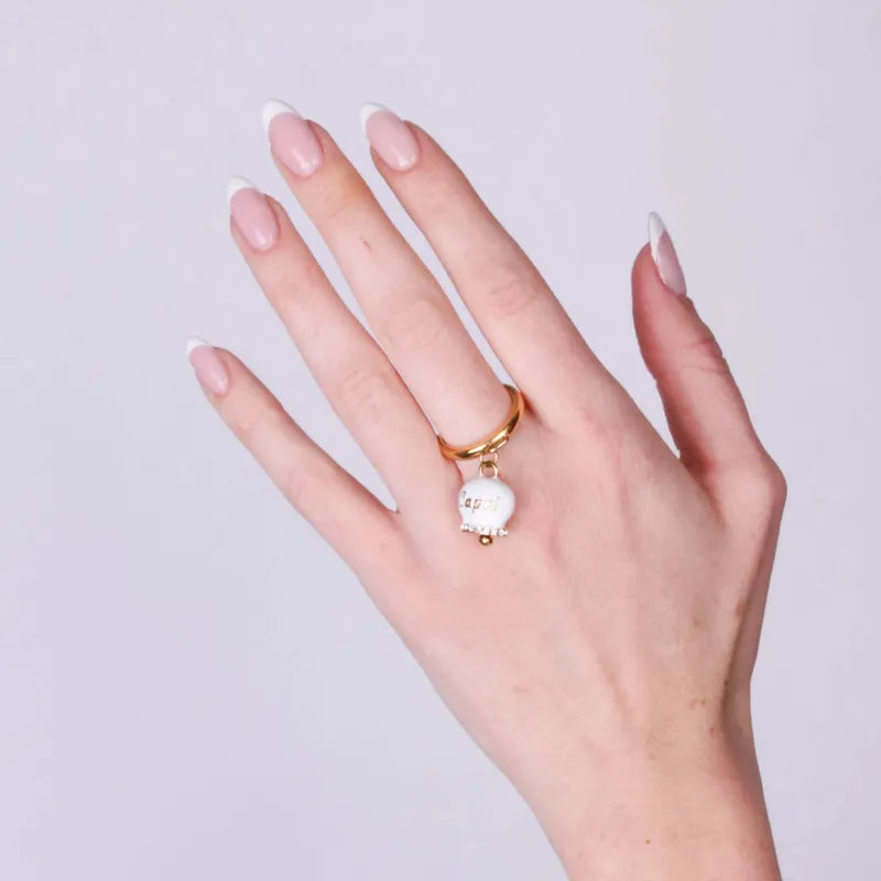 AMO CAPRI - ANELLO ACCIAIO DORATO CON CAMPANELLA SMALTO BIANCO E CRISTALLI