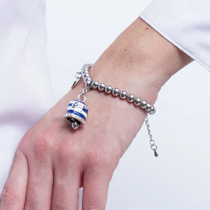 AMO CAPRI - BRACCIALE IN ACCIAIO CON CAMPANELLA RIGHE BIANCHE E BLU