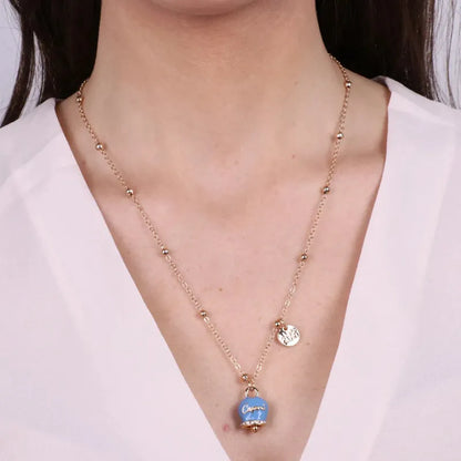 AMO CAPRI - GOLD-TONE METAL NECKLACE WITH AVIATOR BLUE BELL CHARM
