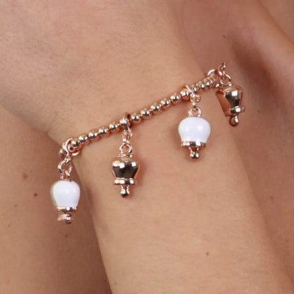 AMO CAPRI - ROSE METAL BRACELET WITH WHITE AND ROSE BELLS