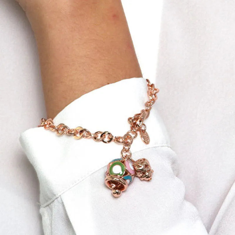 AMO CAPRI - BRACCIALE IN METALLO ROSE' CON CAMPANELLA GRANDE MULTICOLOR E PICCOLA A CUORI
