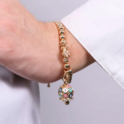 AMO CAPRI - BRACCIALE IN METALLO DORATO CON POIS E ZIRCONI