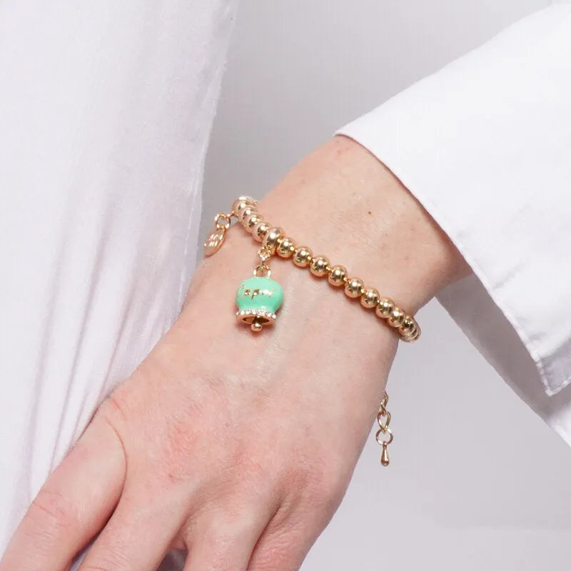AMO CAPRI - BRACCIALE IN METALLO DORATO CAMPANELLA VERDE MENTA SCRITTA CAPRI