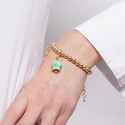AMO CAPRI - BRACCIALE IN METALLO DORATO CAMPANELLA VERDE MENTA SCRITTA CAPRI