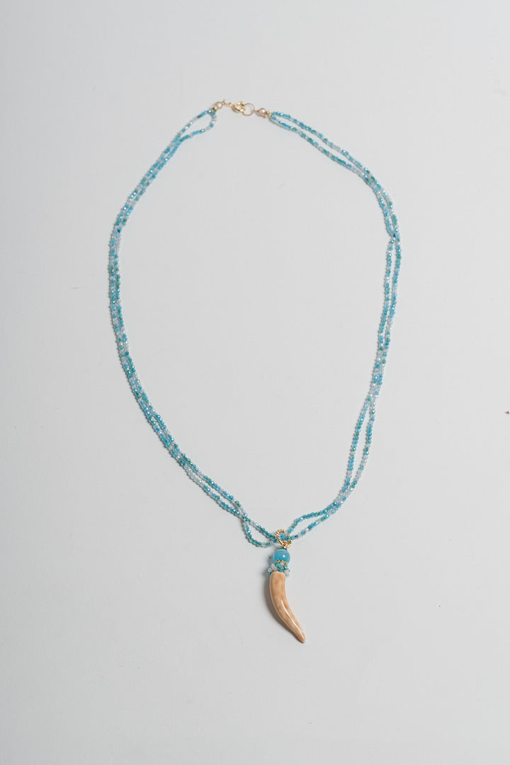 SICYLUI - COLLANA CON CORNO PICCOLO IN CERAMICA CON CRISTALLI AZZURRI