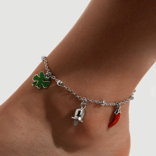 AMO CAPRI - CAVIGLIERA CON CAMPANELLA MINI E CHARMS CORNO E QUADRIFOGLIO