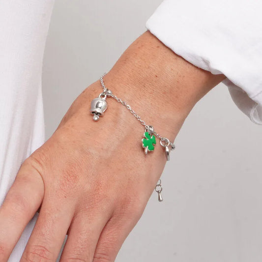 AMO CAPRI - BRACCIALE IN ACCIAIO CON MINI CAMPANELLA E QUADRIFOGLIO