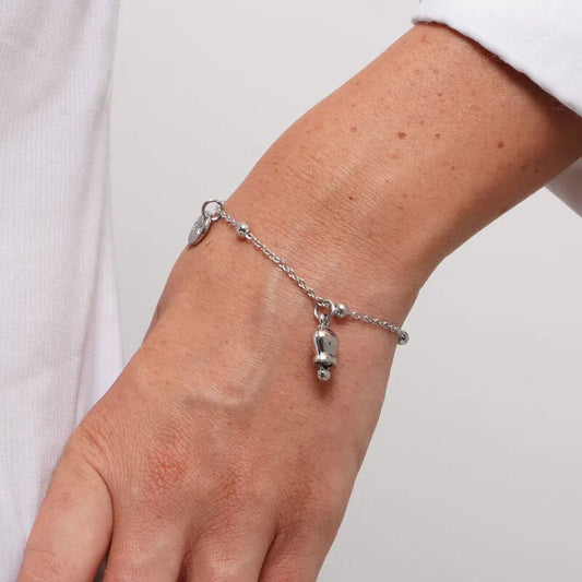 AMO CAPRI - BRACCIALE IN ACCIAIO CON MINI CAMPANELLA E ZIRCONE