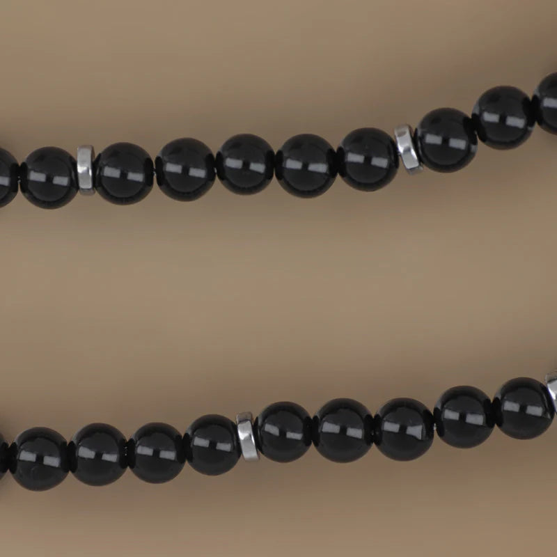 GOYATE' - COLLANA UOMO IN ACCIAIO E PIETRE SFERICHE LISCE NERE