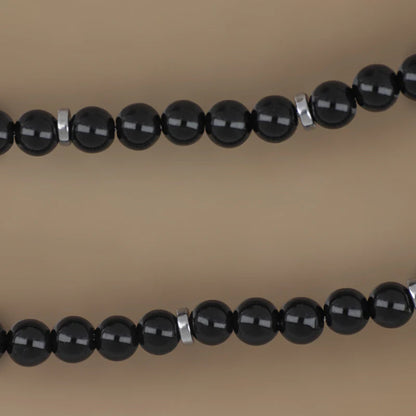 GOYATE' - COLLANA UOMO IN ACCIAIO E PIETRE SFERICHE LISCE NERE