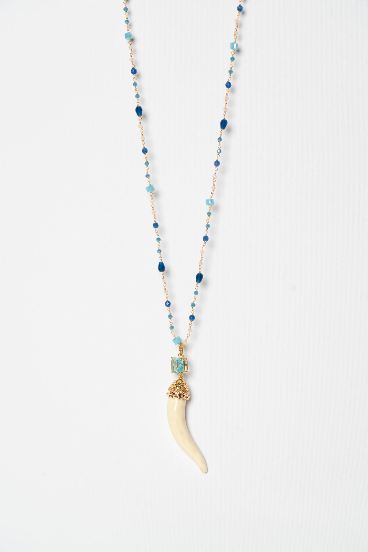 SICYLUI - COLLANA CORNO IN CERAMICA BURRO CON CRISTALLO CENTRALE AZZURRO