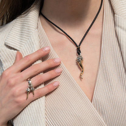 ANELLO CORNI PENDENTI IN ARGENTO E BRONZO