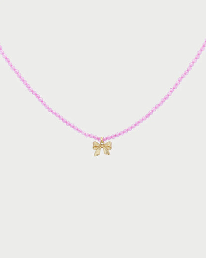 COLLANA GIROCOLLO CON FIOCCO DORATO E FIRLO ZIRCONI ROSA