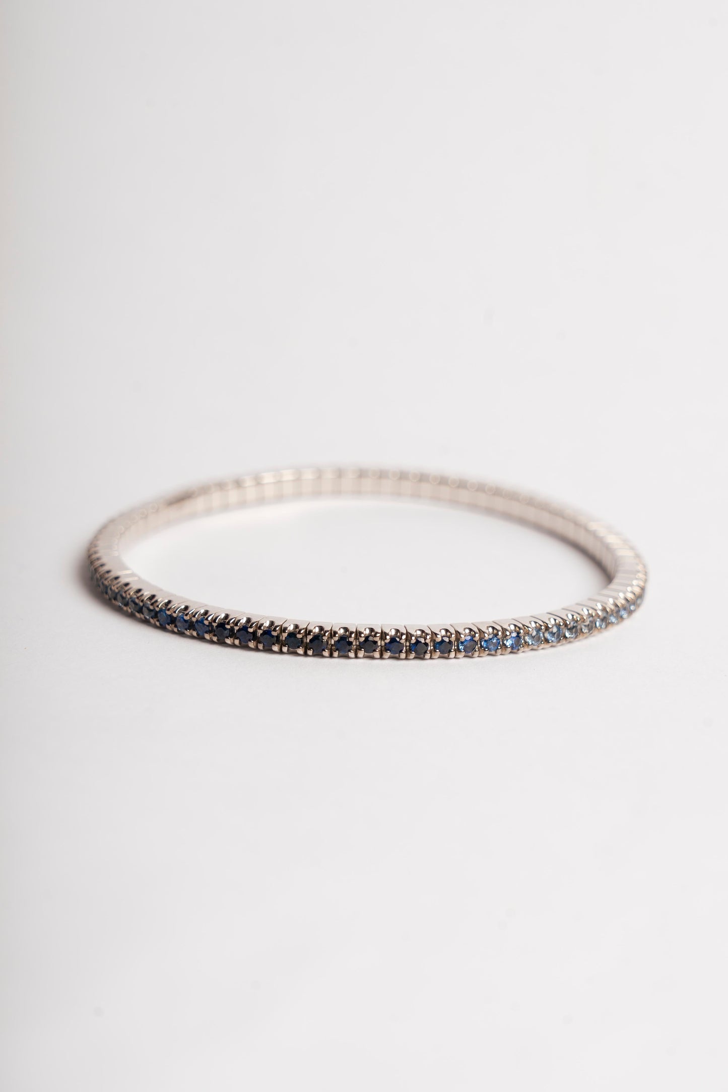 MANO J - TENNIS ELASTICO ORO BIANCO E ZAFFIRI SFUMATI