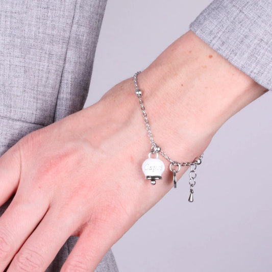 AMO CAPRI - BRACCIALE IN ACCIAIO CON CAMPANELLA PICCOLA BIANCA SCRITTA CAPRI (Copia)