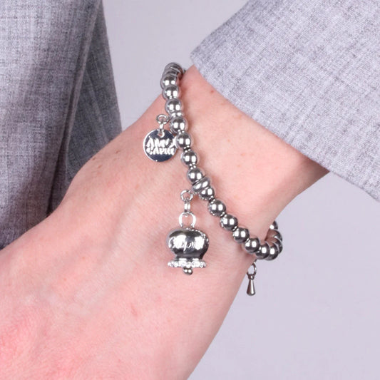 AMO CAPRI - BRACCIALE IN ACCIAIO CON CAMPANELLA RODIO SCRITTA CAPRI E CRISTALLI