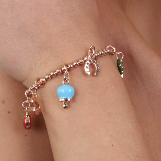 AMO CAPRI - BRACCIALE IN METALLO CON SIMBOLI PORTAFORTUNA E CAMPANELLA